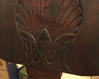Hand carved seat back.