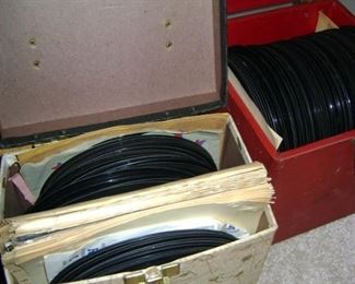 Numerous boxes of 45 RPM records from the 50's.