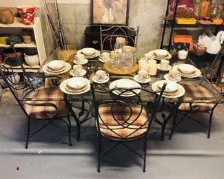 Rectangle glass top table with 4 wrought iron chairs - all in good condition! 