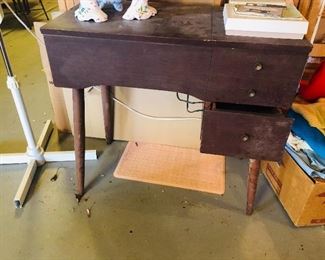 Kenmore sewing machine - OR buy it to use as a desk! Very MCM (mid century modern). 