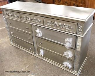 NEW 9 Drawer Contemporary Low Chest in the Silver Color 

Auction Estimate $ 200-$400 – Located Inside 
