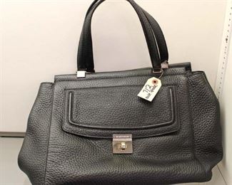 Authentic “Kate Spade” Black Leather Purse 

Auction Estimate $100-4300 – Located Inside

