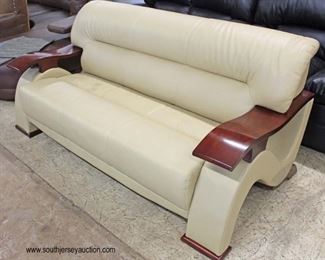  NEW Ultra Modern Leather Sofa with Lacquer Mahogany Arms and Legs

Auction Estimate $300-$600 – Located Inside 