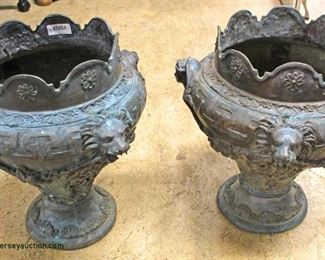  PAIR of ANTIQUE Lion and Lady Head Bronze Planters

Located Inside – Auction Estimate $300-$600

  