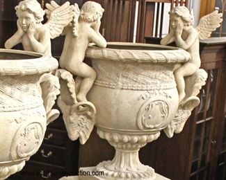  PAIR of Large 2 Piece Composition Planter Urns with Cherubs on Ram Heads

 (Approximately 5’ High)

Auction Estimate $500-$1000 – Located Out Front 