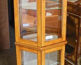  NEW Octagon Shape Lighted Mirror Back Display  Door Glass Shelved Cabinet in the Oak Finish by “Home Meridian”

Located Inside – Auction Estimate $100-$200 