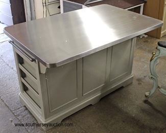  NEW ‘Universal’ Stainless Steel Top Kitchen Island

with Seasoning Shelved Sides, Towel Bar, Over hang to allow for Bar Stools in the Country Style

Located Inside – Auction Estimate $300-$600 