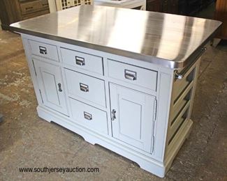  NEW ‘Universal’ Stainless Steel Top Kitchen Island

with Seasoning Shelved Sides, Towel Bar, Over hang to allow for Bar Stools in the Country Style

Located Inside – Auction Estimate $300-$600 