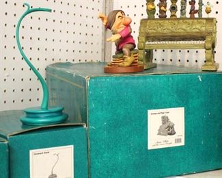   “Classic Walt Disney Snow White and the Seven Dwarfs Collection”

Seven Drarfs with Original Boxes and Disney Peter Pan Tinker Bell Ornament Stand

Auction Estimate $20-$200 each – Located Glassware 