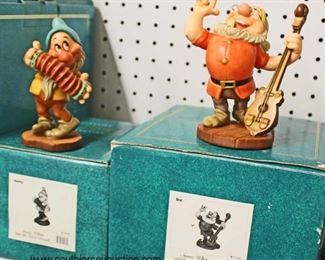   “Classic Walt Disney Snow White and the Seven Dwarfs Collection”

Seven Drarfs with Original Boxes and Disney Peter Pan Tinker Bell Ornament Stand

Auction Estimate $20-$200 each – Located Glassware 
