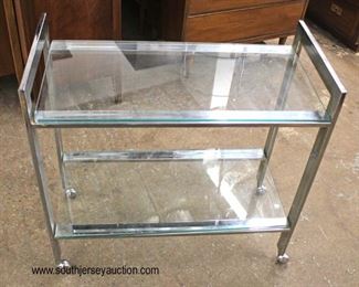  Modern Design Glass and Chrome Tea Cart

Auction Estimate $100-$200 – Located Inside 