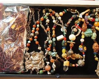 Fetish necklaces, as is garnet necklace