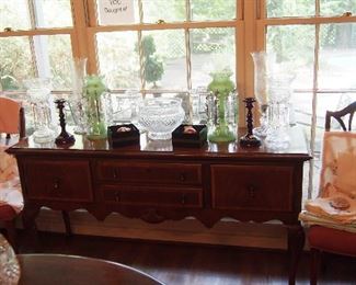 Fine Sideboard covered w/ Vintage Baccarat Candle holders and Art Glass