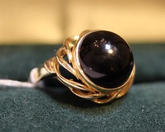 Black onyx ring set in yellow gold.