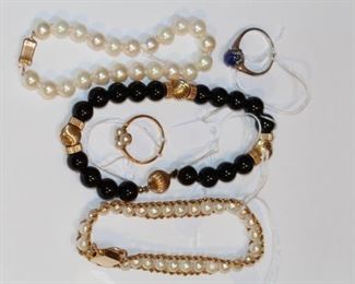 Bracelets and rings.  