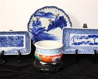 Early Asian pottery pieces.  