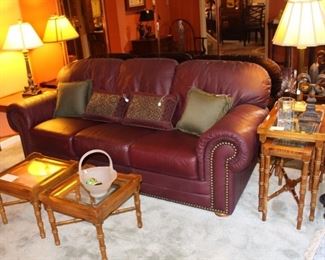 Living room is full of quality furniture and decor.