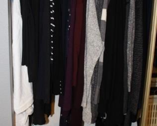 Large amount of clothing, shoes and purses.  