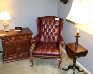 Leather chair, drop leaf lamp table and night stand.