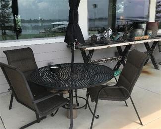 Table , 4 chairs and umbrella