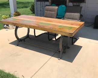 Custom made iron base table with custom finished wood top