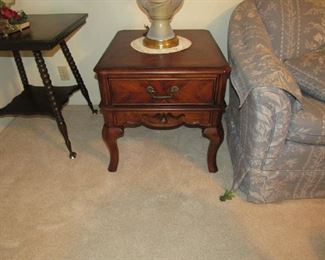 One of two matching side tables