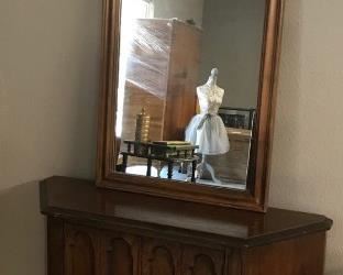 small cabinet with wall mirror