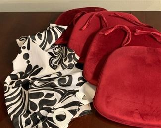 red seat cushions and shower curtain