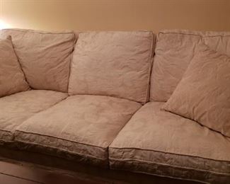 Textured Cream colored Upholstered Domain Sofa