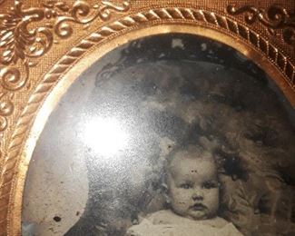 very old tin type. in leather case