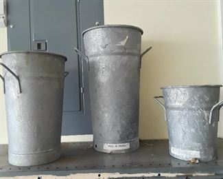 Three tall metal, marked France.