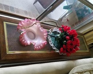 antique glass and behind sofa table