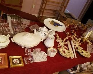 glassware, candle holders and misc. the gold colored wall hangings in this picture has been sold