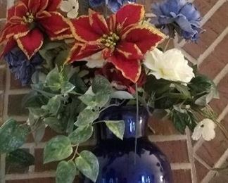 BLUE VASE OF ARTIFICIAL FLOWERS