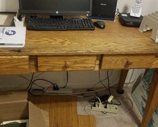 WOOD DESK WITH COMPUTER AND MONITOR