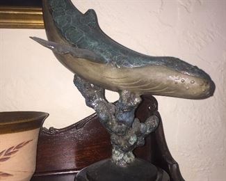 Signed whale statue