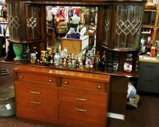 CHEST OF DRAWERS WITH LIGHTED. BACKBAR,  OR OTHER USE PIECE , SITTING ON TOP.