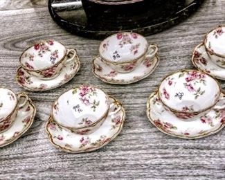 HAVILAND CUPS AND SAUCERS