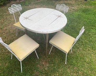 Umanoff outdoor chairs and 50’s starburst table