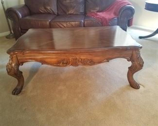 Beautiful solid wood coffee table with inlayed top.  $70