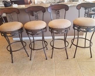 Beautiful set of 4 bar stools with comfortable upholstered seats and solid wood & metal construction.  $200 for Set of 4