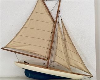 Model sailboat, blue hull