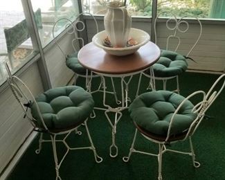 Small wrought iron parlor table and chairs sold