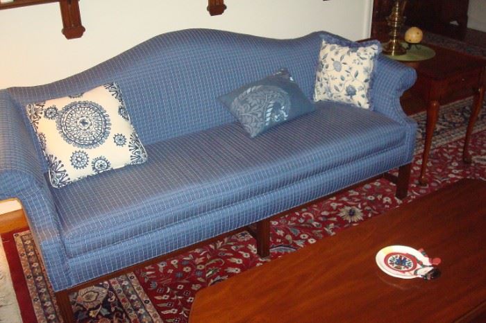 Custom upholstered camel back Chippendale style sofa