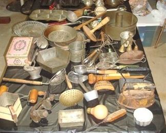 Table of mostly antique kitchen primitives