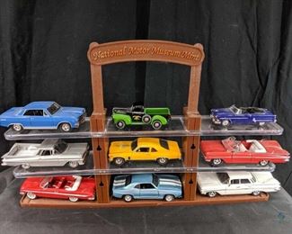 National Motor Museum Mint display stand and 9 Die-cast cars