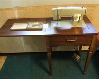 Kenmore Sewing Machine in cabinet
