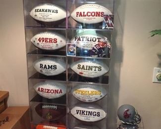 more footballs than you can throw a stick at-many signed