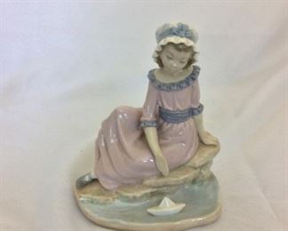 Lladro Girl with Paper Boat, 6 1/4" H.