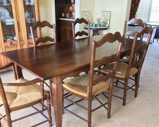 Dining Room Table and 6 Ladder Back Cane Chairs. 78" L x 38" W x 30 1/2" H.